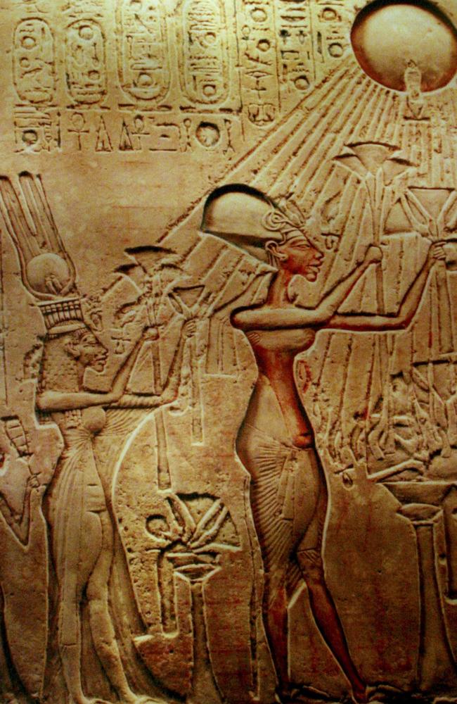 Writ in stone ...  Heretic Pharaoh Akhenaten, his Queen Nefertiti and their children worshipping the sun god Aten. Source: AP