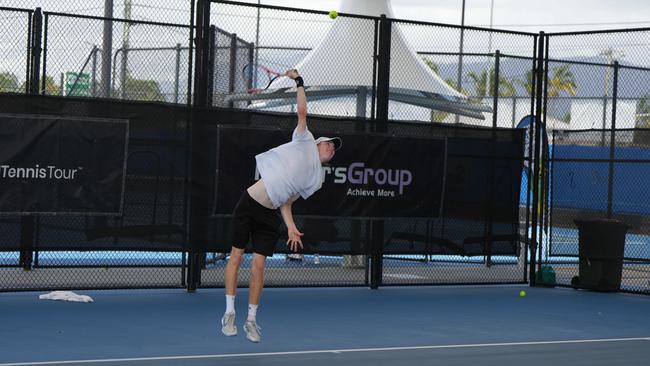 Thomas Patton throws down a serve in his Monday qualifying match. Picture: Nuno Avendano.