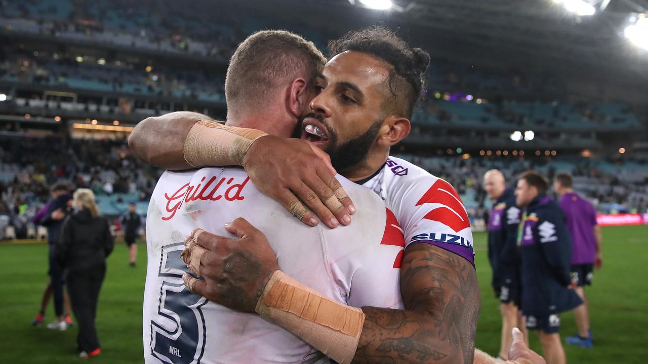 Lee with Josh Addo-Carr after winning the grand final with the Storm. Photo by Cameron Spencer/Getty Images