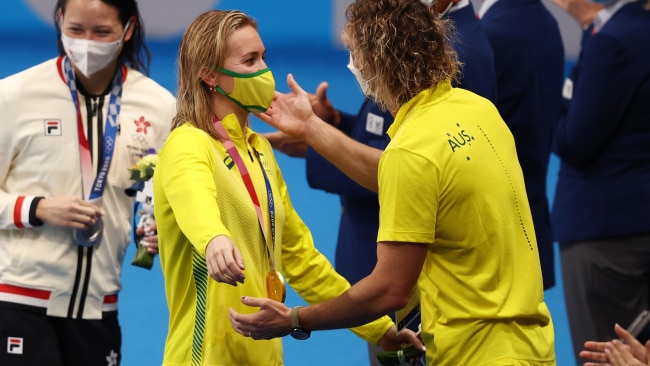 Ariarne Titmus with her coach Dean Boxall after winning the gold medal in the Women's 200m Freestyle Final. Photo: Clive Rose/Getty Images