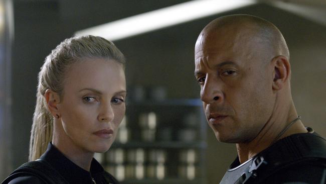 Criminal mastermind Cipher (Charlize Theron) and Dom (Vin Diesel) in a scene from <i>The Fate of the Furious</i>.