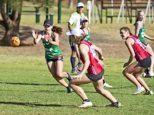 CLOSE FINAL: Sharks player Izzy Reed lines up the ball during her side's Toowoomba Touch Association grand final clash against Roosters. Roosters won the match 4-1. Picture: Nev Madsen