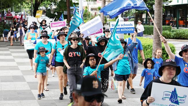 Members of the Queensland Teachers Union and their families participate in the annual Labour Day march, held along the Cairns Esplanade. Picture: Brendan Radke