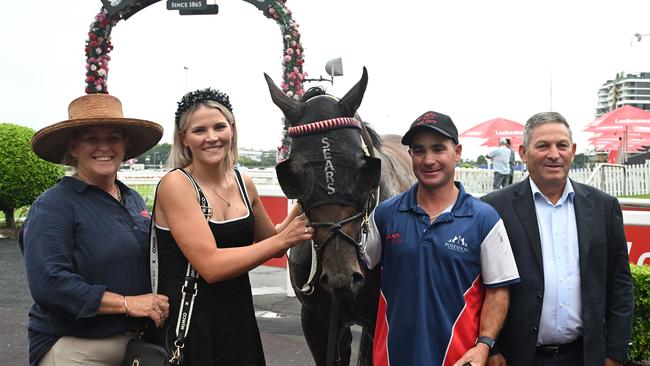 Trainers Tony (far right) and Maddy Sears (second from left) with their star colt Beau Dazzler at Eagle Farm. Picture: Grant Peters / Trackside Photography