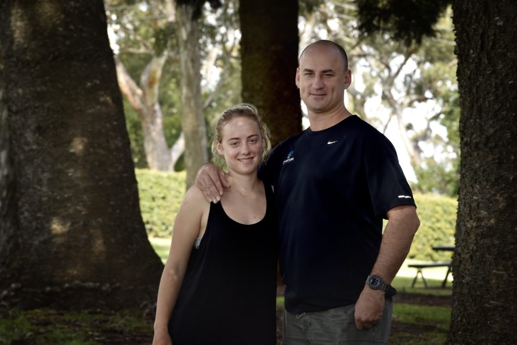 Mountaineer Alyssa Azar with her father, Glenn Azar. Alyssa arrives back in Toowoomba from Mt Everest after the earthquake. Picture: Bev Lacey