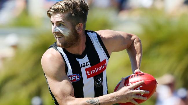 Collingwood’s Sam Murray charges out of defence. Picture: Michael Klein