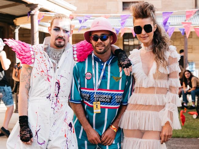 Daniel Johns and Michelle Leslie (pictured with producer Chris Emerson, middle) are said to be getting married. Leslie is seen wearing a diamond ring. Picture: Supplied