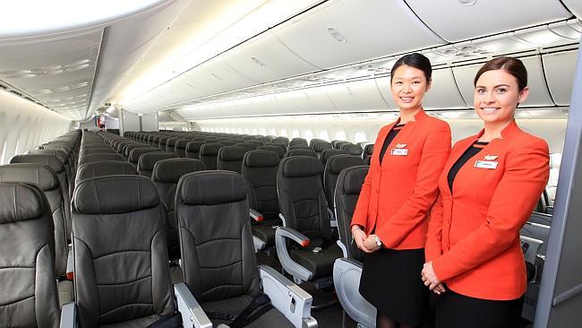 Proy Paiboonbudsrakm and Jessica Leaf welcome passengers aboard Jetstar's new 787-800 Dreamliner.
