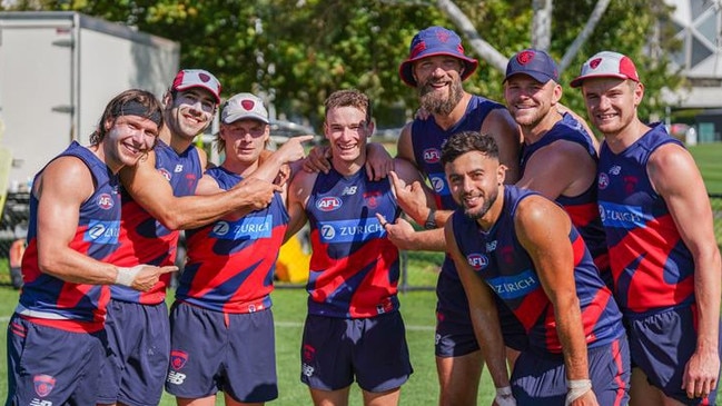 Jack Henderson is welcomed to the Dees by his new teammates. Picture: MelbourneFC