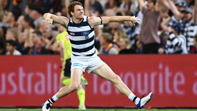 Gary Rohan of the Cats celebrates a big preliminary final goal.