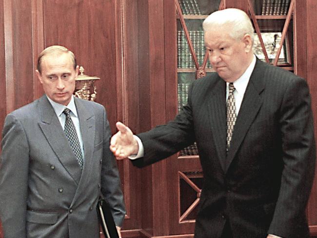 Mr Putin and his predecessor as president Boris Yeltsin in 1998.