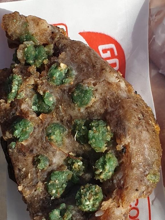 A piece of hamburger or processed meat impregnated with rat or slug poison pellets that was thrown into the garden of a property in Whitney St, Mona Vale recently. Picture: Facebook