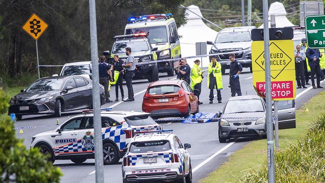 Emergency services at the scene on the Gold Coast Highway in Arundel where a man was shot dead by police. Picture: Nigel Hallett.