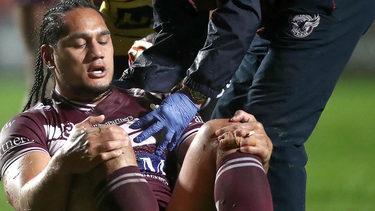 Martin Taupau is worse for wear after being hit in a high tackle by the Warriors’ Jack Hetherington. Picture: Getty Images