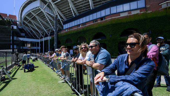 Keen fans watch the Australian team train ahead of the second Test against India Picture: Getty Images