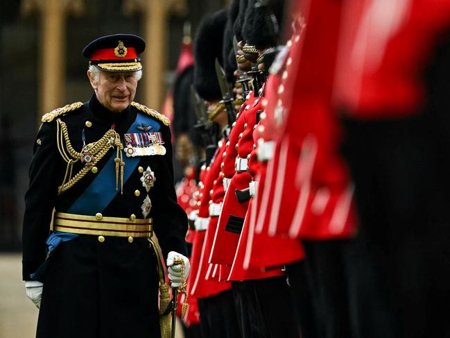 King Charles III reviews the Irish Guards during a ceremony where he presents New Colours to No 9 and No 12 Company The Irish Guards at Windsor Castle. Picture: AFP