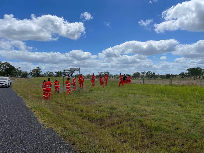 The scene at Biggenden as SES search the surrounding fields after a shed fire claimed two lives.