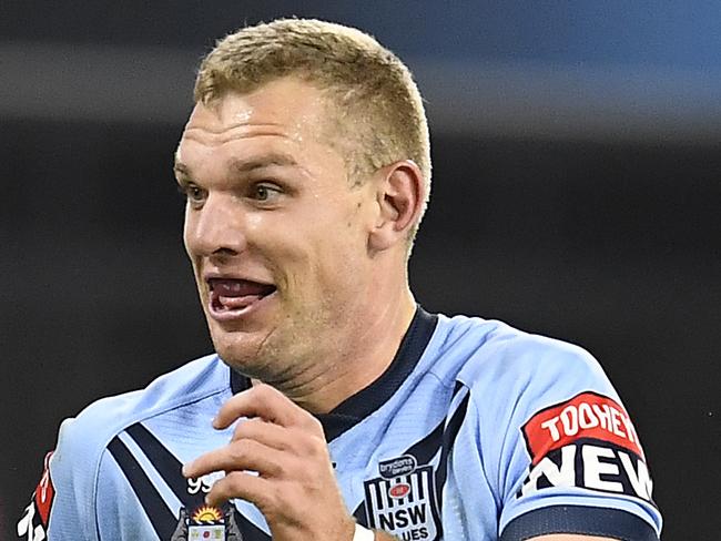 TOWNSVILLE, AUSTRALIA - JUNE 09: Tom Trbojevic of the Blues runs to score a try during game one of the 2021 State of Origin series between the New South Wales Blues and the Queensland Maroons at Queensland Country Bank Stadium on June 09, 2021 in Townsville, Australia. (Photo by Ian Hitchcock/Getty Images)