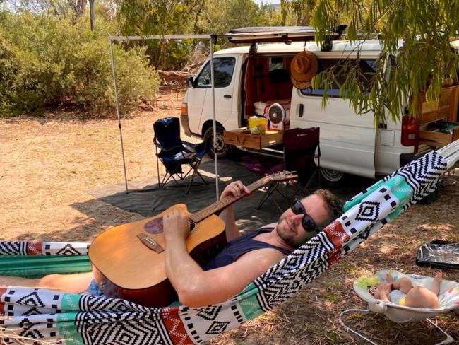 Andrew Garnett with his son Sonny on one of the family's campervan adventures. Picture: Contributed
