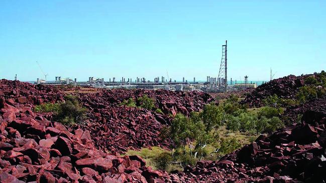 Outcrop of rocks with engravings near industry on Burrup Peninsula. Picture: supplied