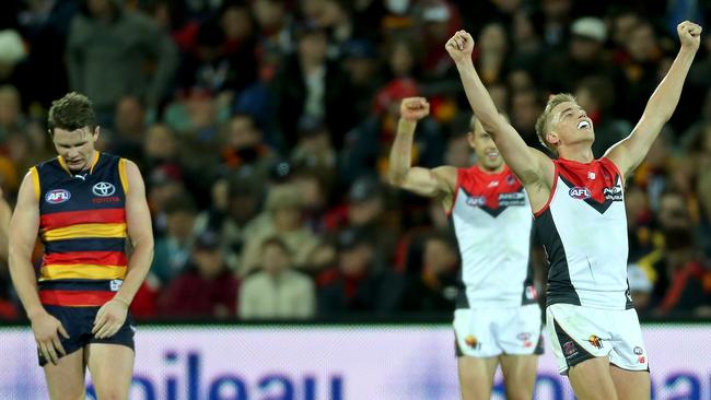 Just about sums it up ... Bernie Vince celebrates a Melbourne win against his old team Adelaide. Picture: Simon Cross