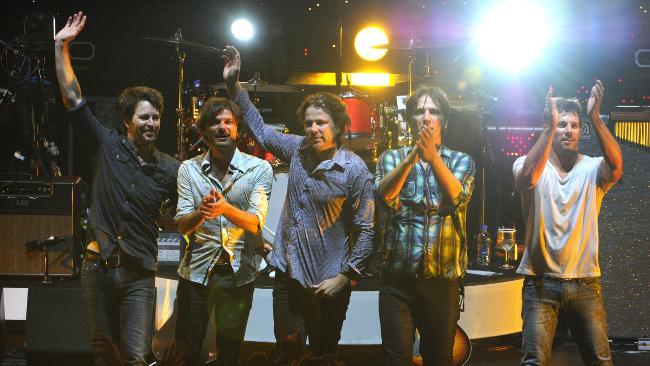 FAREWELL: Powderfinger bid farewell at the end of their last performance together at the Riverstage in Brisbane on Saturday. Picture by Dave Hunt