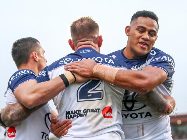 Scott Drinkwater, Kyle Feldt and VIliami Vailea celebrate a North Queensland Cowboys try against Penrith Panthers in Round 17 of the NRL at BlueBet Stadium on June 30, 2024. Picture: NRL Photos