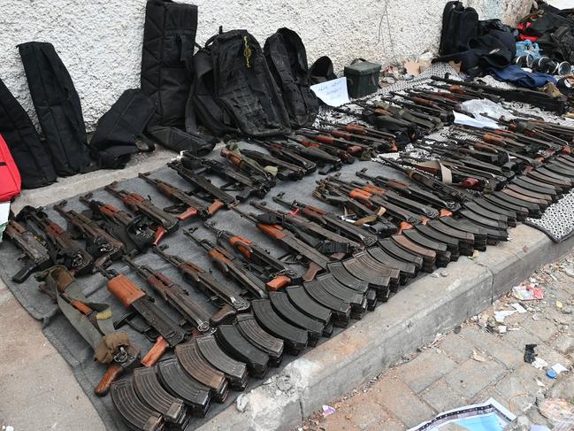 Weapons that the Israeli Army says were left behind by Hamas militants in the al-Shifa hospital. Picture; AFP.