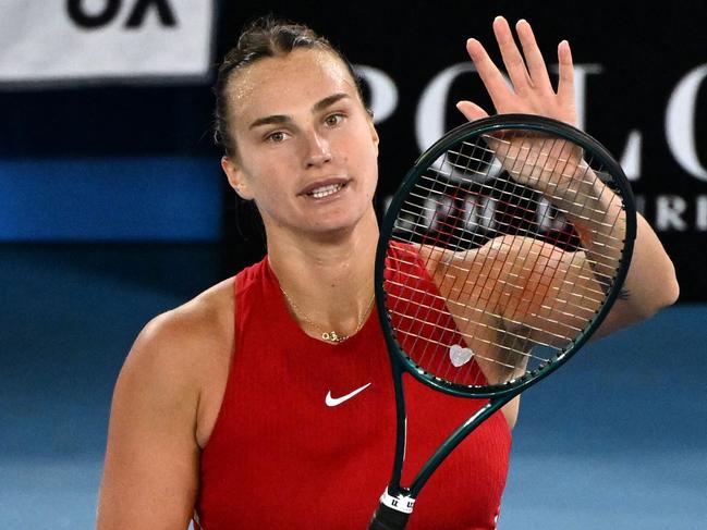 Belarus' Aryna Sabalenka celebrates after victory against Germany's Ella Seidel in their women's singles match on day one of the Australian Open tennis tournament in Melbourne on January 15, 2024. (Photo by WILLIAM WEST / AFP) / -- IMAGE RESTRICTED TO EDITORIAL USE - STRICTLY NO COMMERCIAL USE --