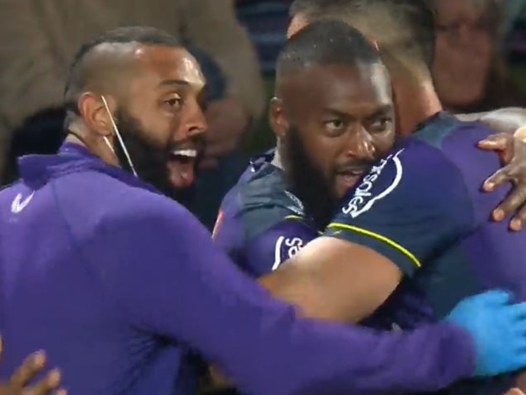 Josh Addo-Carr shares a moment with the team after the Storm scores against Manly. Picture: Fox Sports