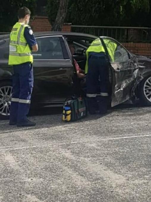 Paramedics check on Mr Albanese just after the crash. Picture: Facebook