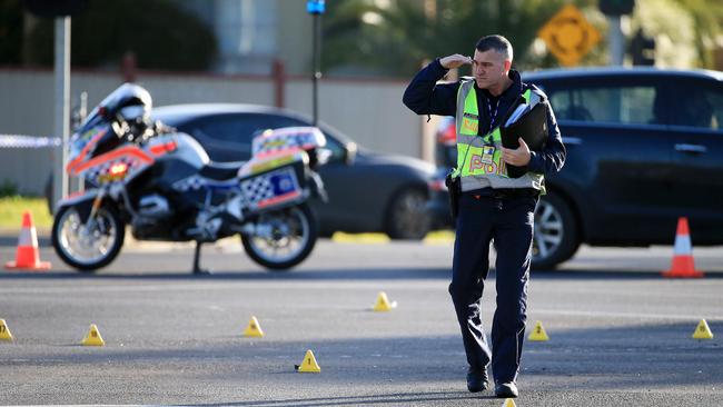 Emergency services were called to the Melton Highway near McCubbin Drive in Taylors Lakes at 6.40am after reports of a collision between a vehicle and cyclist. Picture: Mark Stewart