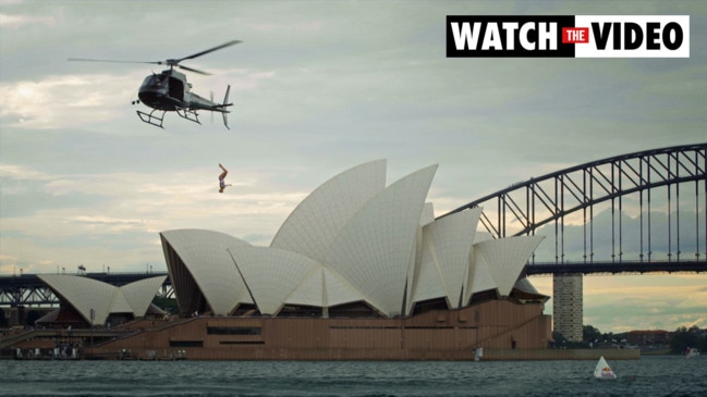 Rhiannan Iffland dives from a helicopter in Sydney Harbour