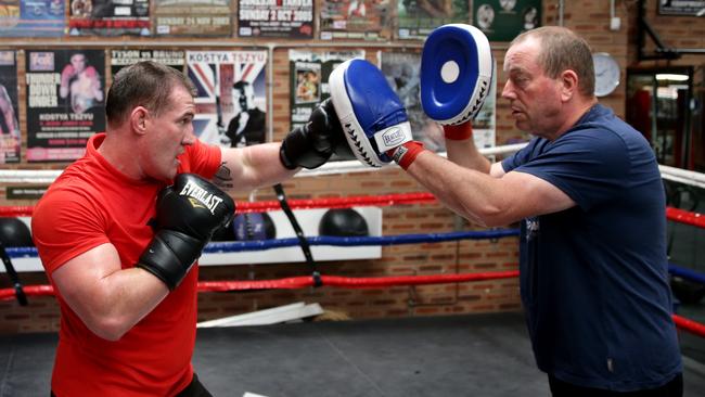 Paul Gallen hits the pads with trainer Graham Shaw. Picture: Gregg Porteous