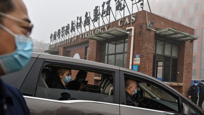 Members of the World Health Organisation team investigating the origins of the Covid-19 virus arrive at the Wuhan Institute of Virology. Picture: AFP