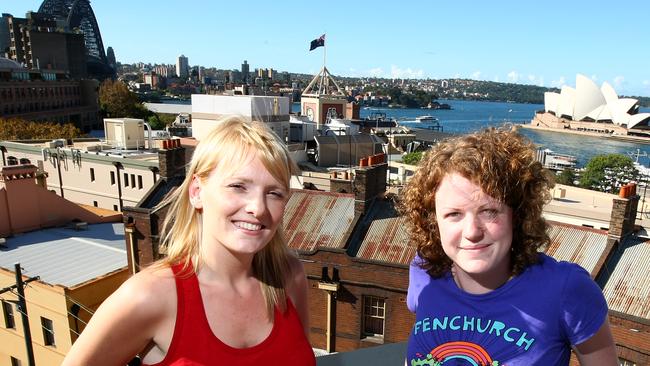 UK tourists Catherine Wilce (R) and Claire Williams on the roof of the YHA Sydney Harbour hostel in Sydney.