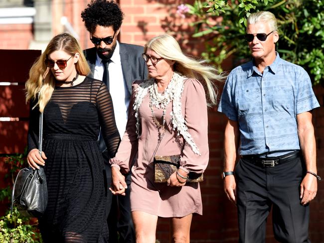 Mourners arrive at the Essendon church. Picture: Nicole Garmston