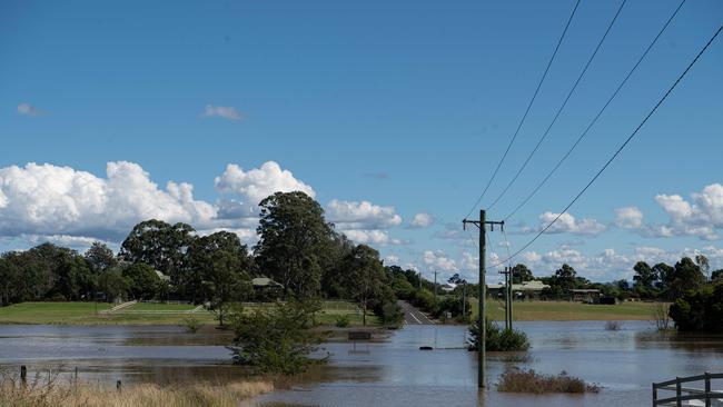 Flooding cuts roads in Pitt Town in Sydney’s northwest. Picture: NCA NewsWire / Flavio Brancaleone