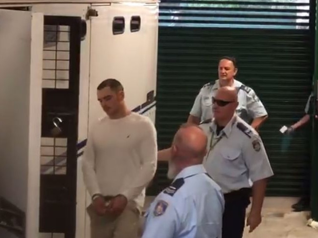 Matthew Flame being led out of Manly Local Court on November 5, 2018. Picture: Olivia Caisley/The Australian