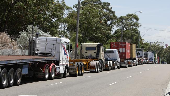 A line up of trucks on Botany Road waiting to gain entry to Patrick's freight loading docks at Port Botany, Sydney.