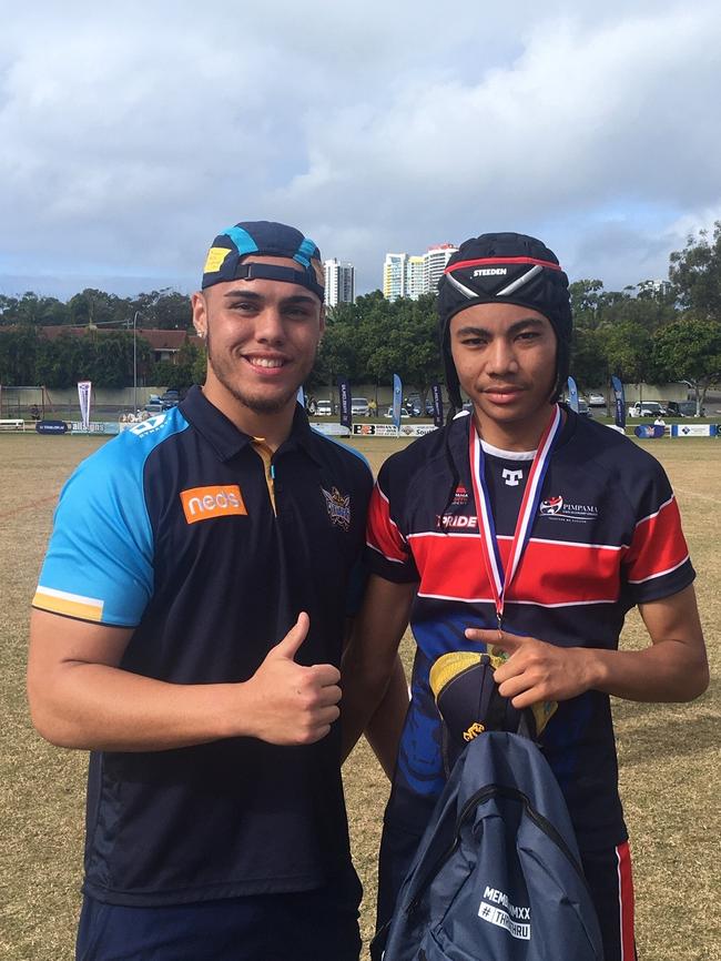 Titans' Iszac Fa'asuamaleaui with Div 2 man of the match Druzel Tuala.