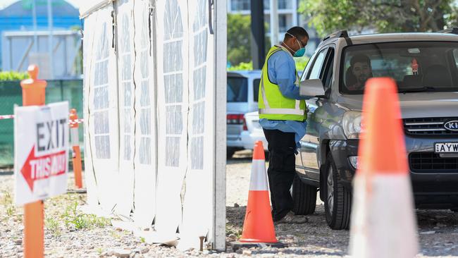 A health care worker at a drive-through COVID-19 testing clinic in Sydney. Picture: NCA NewsWire/Bianca De Marchi