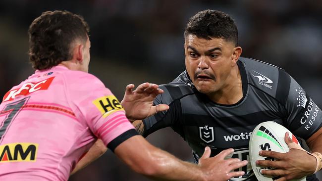 Latrell Mitchell of the Rabbitohs is tackled during the round eight NRL match between South Sydney Rabbitohs and Penrith Panthers at Accor Stadium on April 20, 2023 in Sydney, Australia. (Photo by Cameron Spencer/Getty Images)