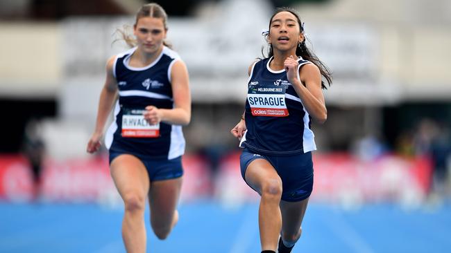 Ariela Sprague, right, competes in the girls U14 100m during the Australian Little Athletics Championships at Lakeside Stadium.