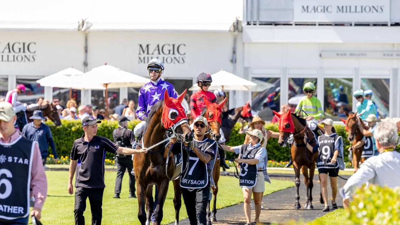 Action at Magic Millions race day. Picture: Luke Marsden.