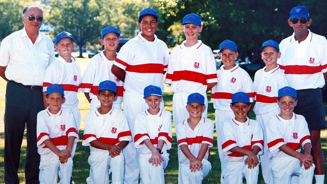 A young David Warner (fourth from left, front row) in his junior school cricket team. Picture: Alan Pryke