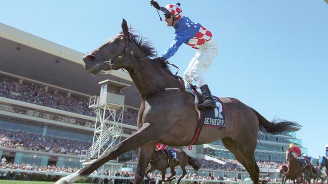 Jockey Glen Boss salutes the Flemington crowd in 2003