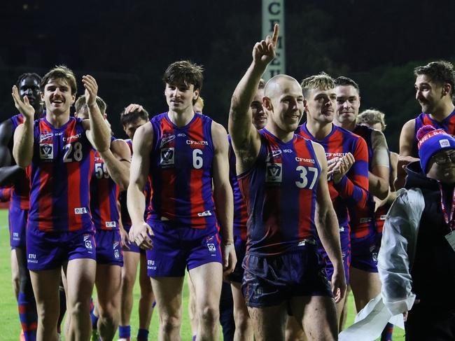Port Melbourne celebrates a win under lights at North Port Oval this year.