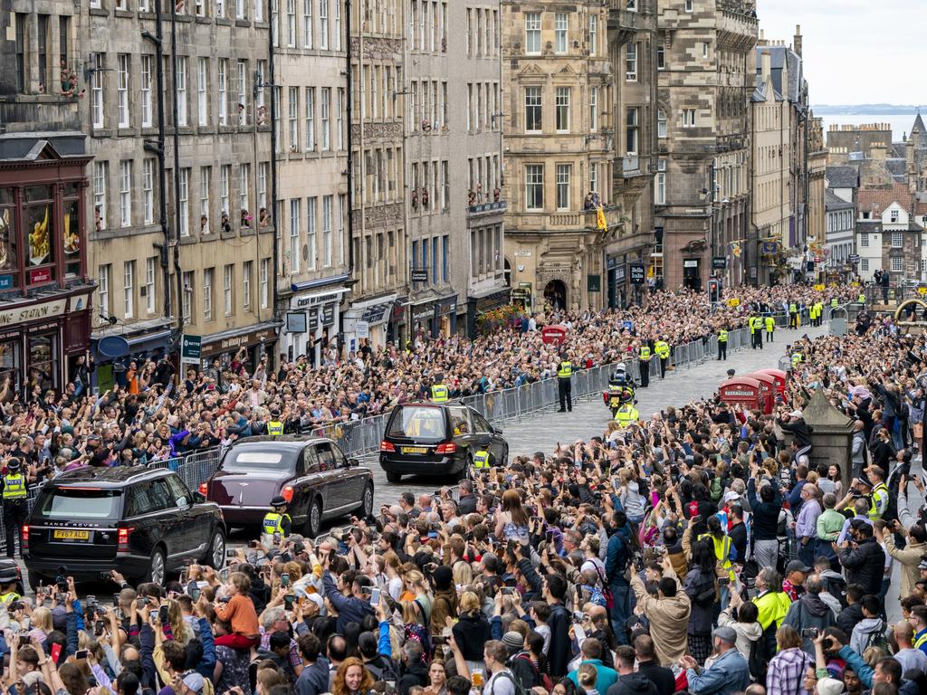 Crowds gather as the Queen’s hearse passes down the Royal Mile, Edinburgh. Picture: Jane Barlow/WPA Pool/Getty Images