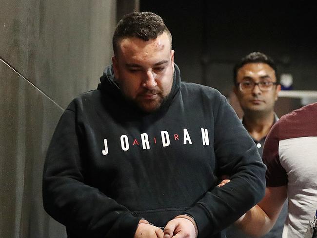 Jimmey Barkho, 30, is taken to the Magistrates Court after his arrest on June 13, 2018. Picture: Alex Coppel